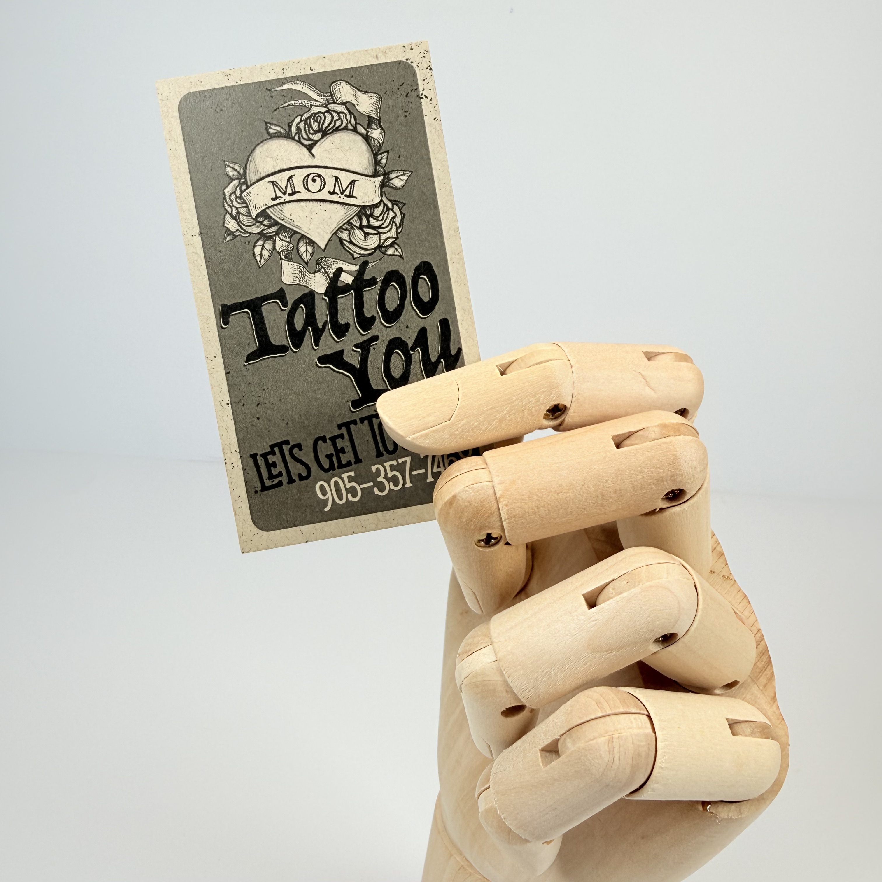 business card on kraft paper
