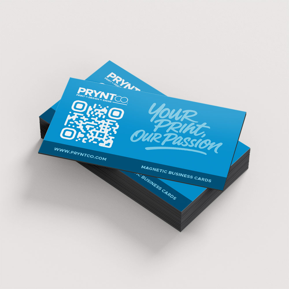 Custom magnetic business cards displayed on a metal surface