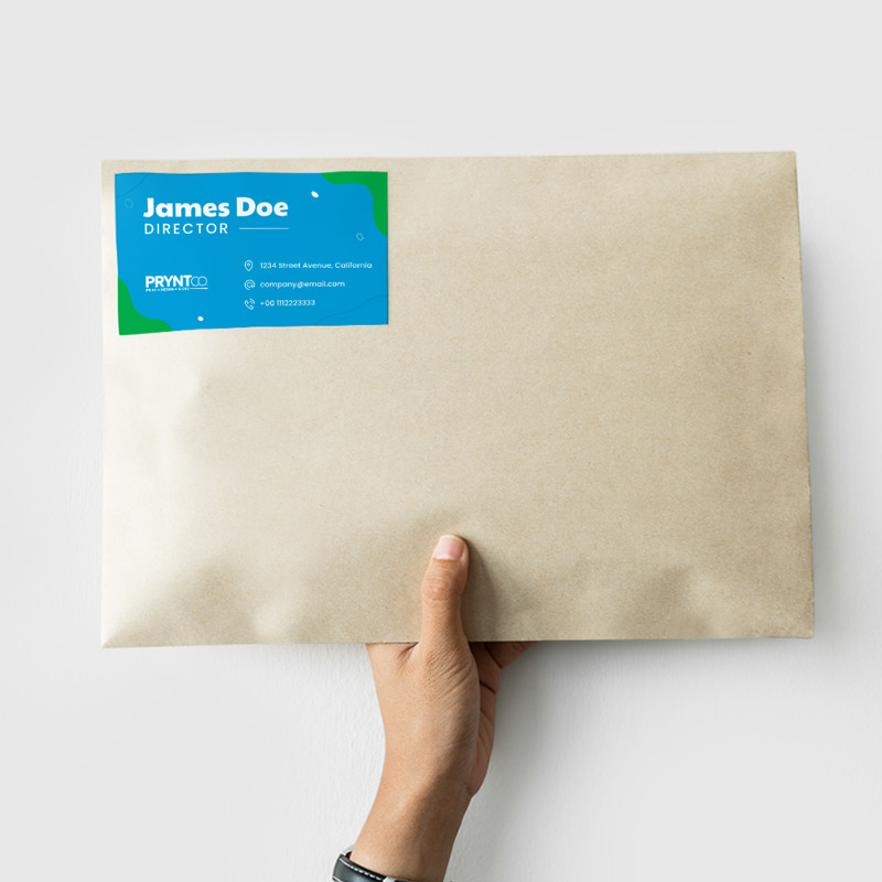 Sheets of custom mailing labels displayed beside envelopes