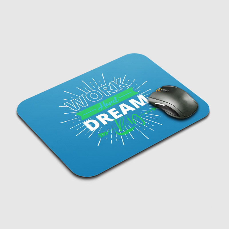Custom printed mouse pad displayed beside a computer mouse