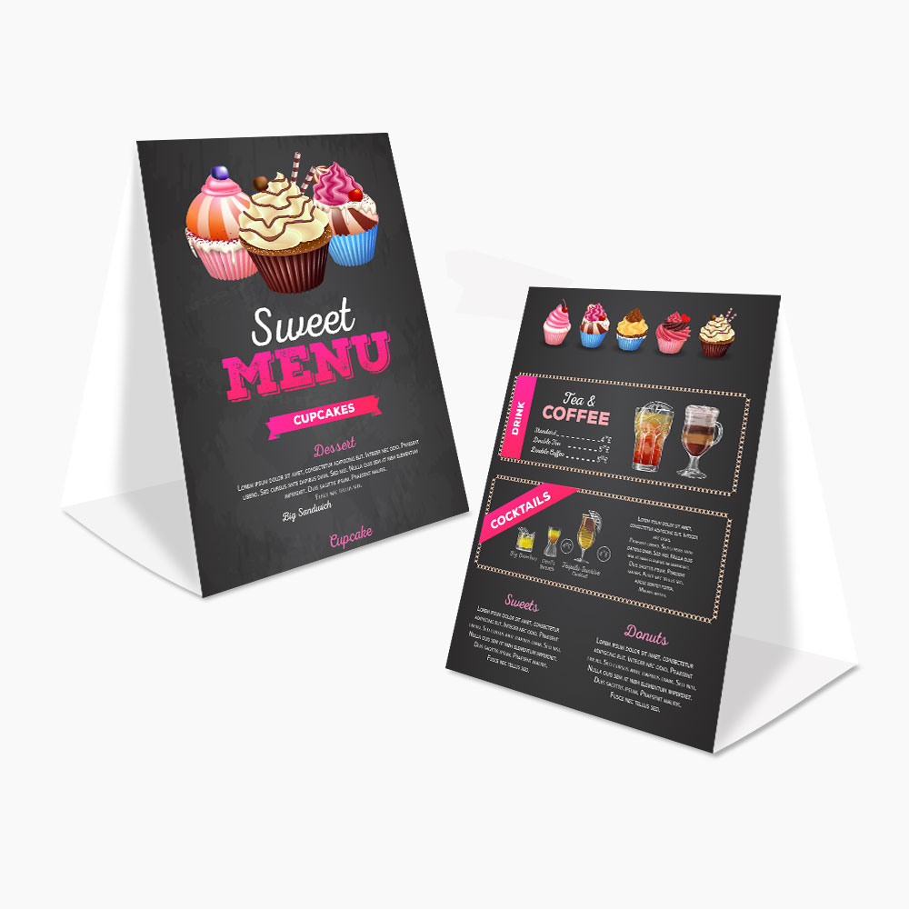 Folded custom tent cards standing on a tabletop