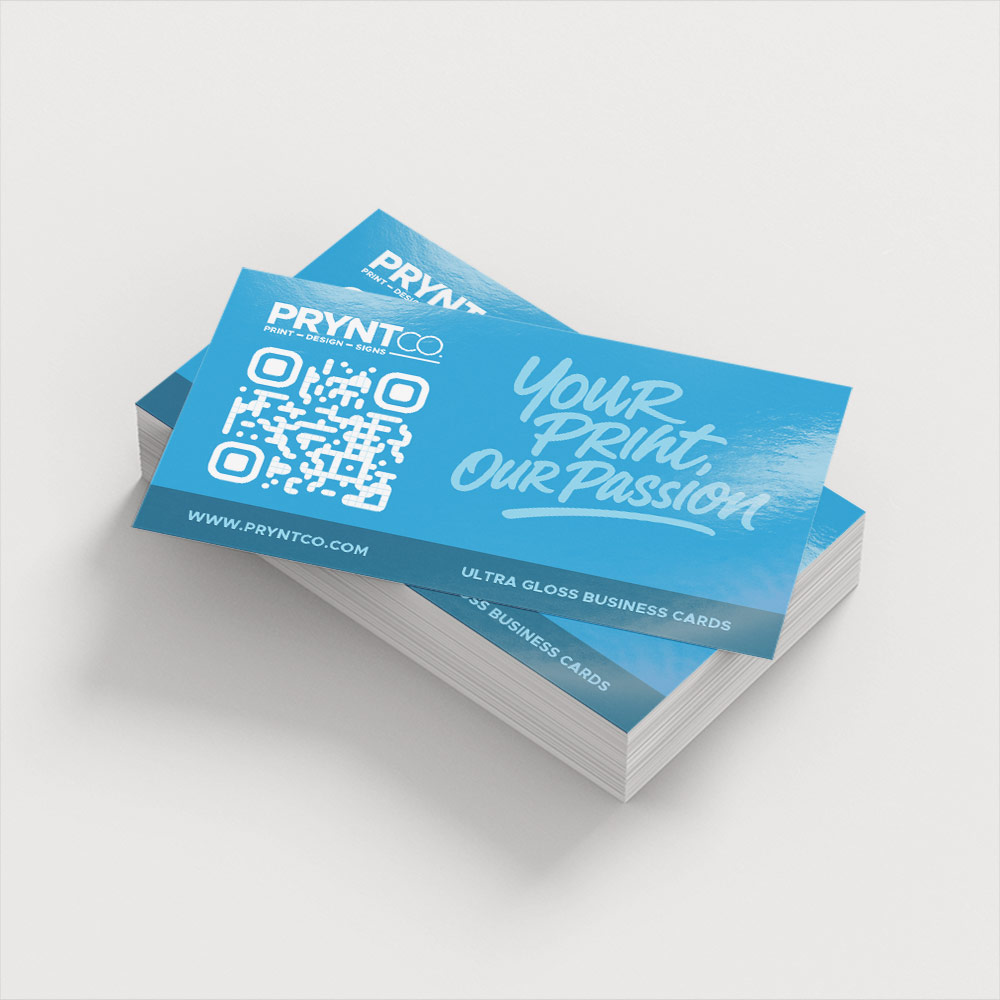 Glossy laminated business cards reflecting light